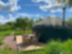 Beautiful view of Cai Yurt in Dorothy's Orchard with blue cloudy skies